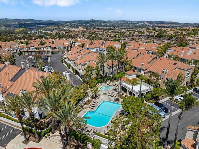 25141 La Jolla Way Unit F, Laguna Niguel, CA 92677 - aerial view of property and surrounding area featuring a pool and nearby suburban area