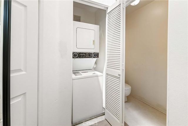 25141 La Jolla Way Unit F, Laguna Niguel, CA 92677 - laundry area with stacked washer / drying machine