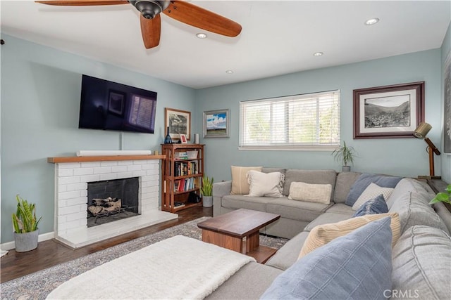 2871 Anza Ln, Costa Mesa, CA 92626 - living area with wood finished floors, a ceiling fan, recessed lighting, and a brick fireplace