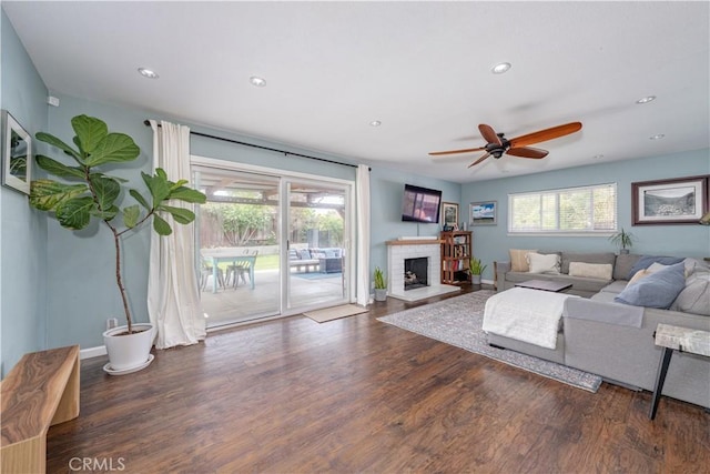 2871 Anza Ln, Costa Mesa, CA 92626 - living area with wood finished floors, a ceiling fan, a fireplace, recessed lighting, and baseboards