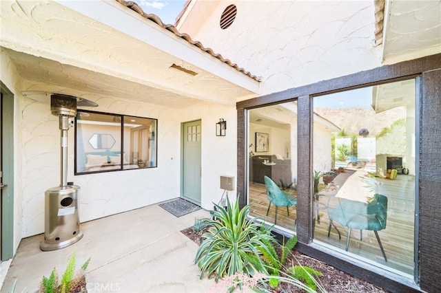 54415 Eisenhower Dr, La Quinta, CA 92253 - entrance to property featuring stucco siding