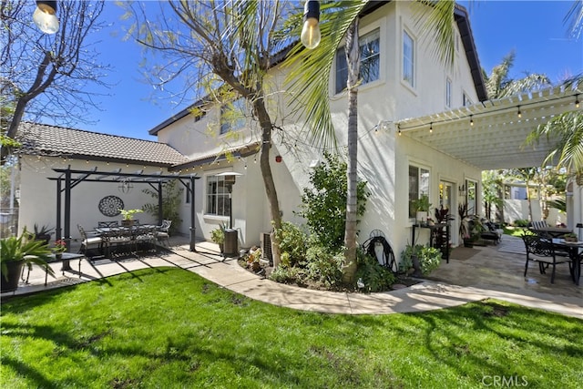11934 Timber Mountain Ct, Rancho Cucamonga, CA 91739 - back of house with a pergola and stucco siding