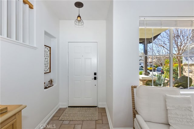 11934 Timber Mountain Ct, Rancho Cucamonga, CA 91739 - foyer with baseboards and healthy amount of natural light