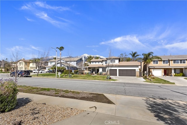 11934 Timber Mountain Ct, Rancho Cucamonga, CA 91739 - view of asphalt road featuring a residential view, street lights, and sidewalks