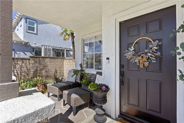 11934 Timber Mountain Ct, Rancho Cucamonga, CA 91739 - doorway to property with a porch and stucco siding