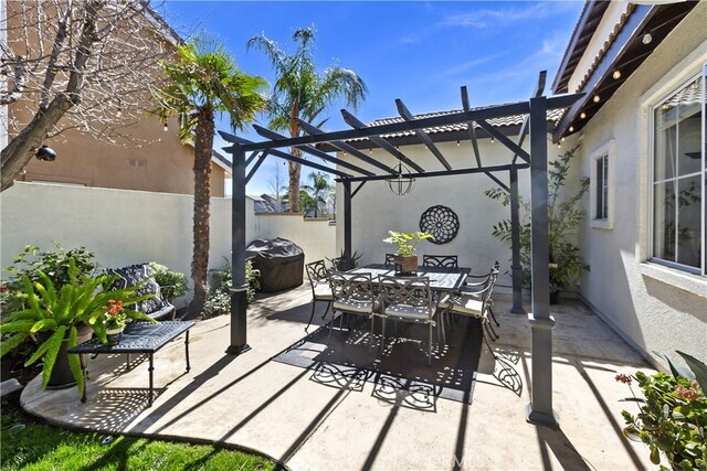 11934 Timber Mountain Ct, Rancho Cucamonga, CA 91739 - view of patio / terrace with a pergola, outdoor dining space, and fence