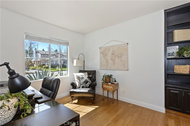 11934 Timber Mountain Ct, Rancho Cucamonga, CA 91739 - office area with baseboards and light wood-style floors