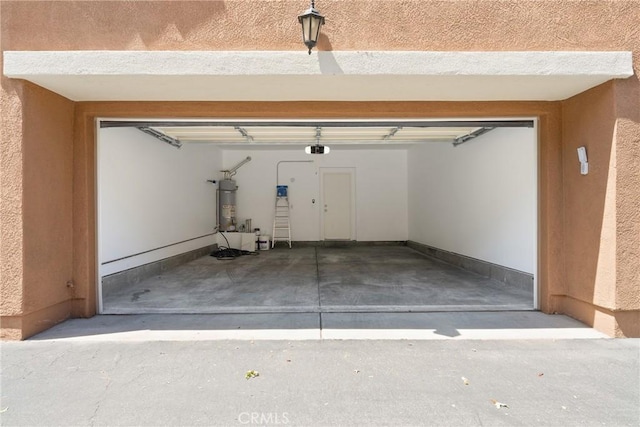 17979 Lost Canyon Rd Unit 104, Canyon Country, CA 91387 - garage featuring water heater and a garage door opener