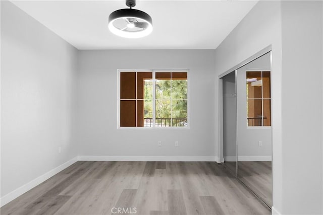 17979 Lost Canyon Rd Unit 104, Canyon Country, CA 91387 - spare room with wood finished floors and baseboards