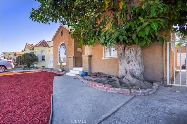 144 W 101st St, Los Angeles, CA 90003 - view of front facade with stucco siding