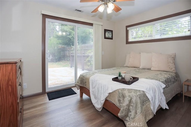 433 Conklin Rd, Big Bear Lake, CA 92315 - bedroom with access to outside, multiple windows, wood finished floors, and ceiling fan
