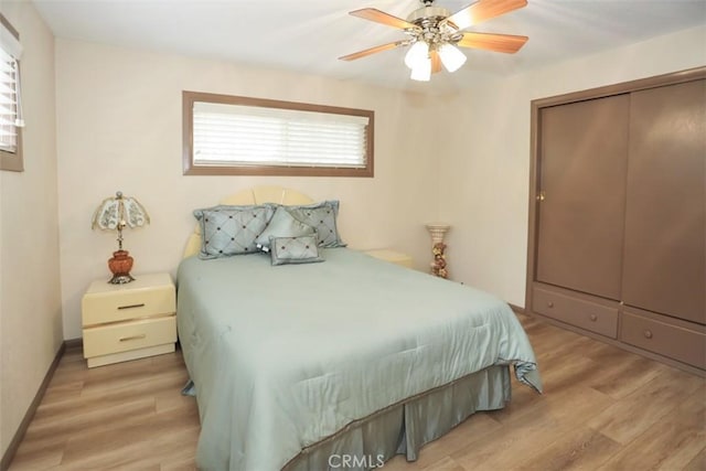 433 Conklin Rd, Big Bear Lake, CA 92315 - bedroom with light wood-style floors, a closet, and a ceiling fan