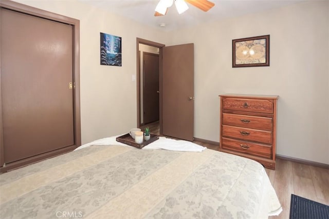 433 Conklin Rd, Big Bear Lake, CA 92315 - bedroom featuring wood finished floors, ceiling fan, baseboards, and a closet