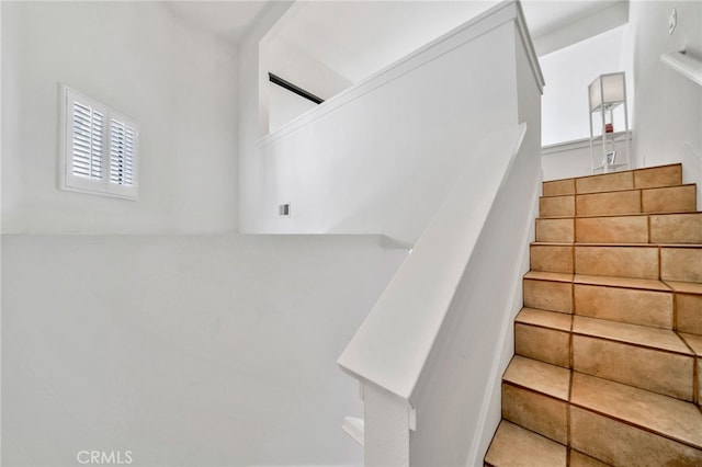 5145 Tortuga Dr Unit 209, Huntington Beach, CA 92649 - stairway featuring healthy amount of natural light