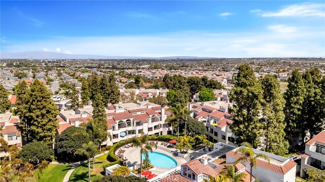 5145 Tortuga Dr Unit 209, Huntington Beach, CA 92649 - aerial perspective of suburban area featuring a pool