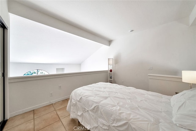 5145 Tortuga Dr Unit 209, Huntington Beach, CA 92649 - bedroom featuring tile patterned flooring and baseboards
