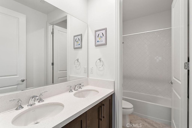 20702 W Chestnut Cir, Porter Ranch, CA 91326 - bathroom featuring toilet, tile patterned floors, double vanity, and  shower combination