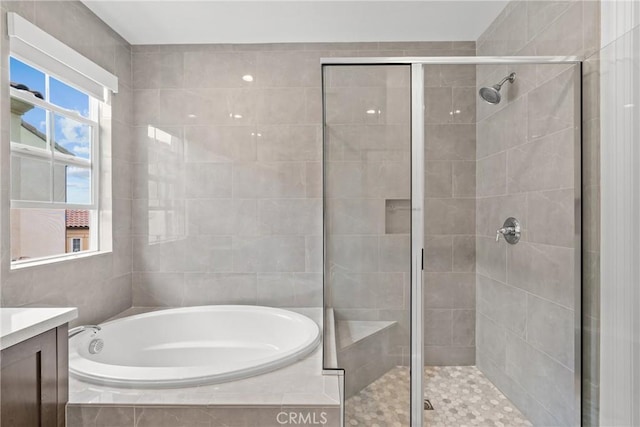 20702 W Chestnut Cir, Porter Ranch, CA 91326 - bathroom with a stall shower, a bath, and vanity