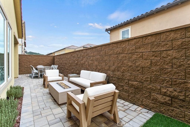20702 W Chestnut Cir, Porter Ranch, CA 91326 - view of patio / terrace with an outdoor fire pit