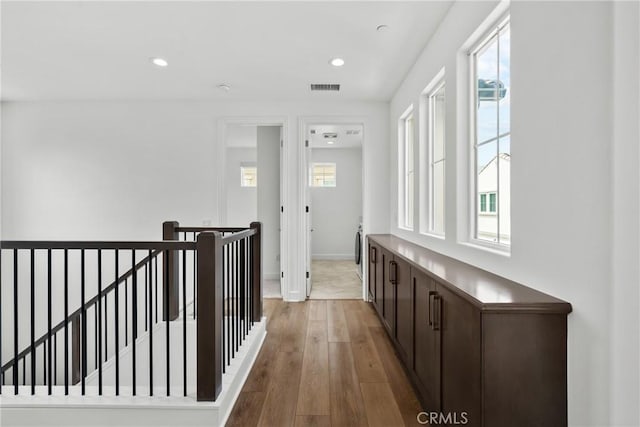 20702 W Chestnut Cir, Porter Ranch, CA 91326 - corridor with an upstairs landing, light wood-style flooring, plenty of natural light, recessed lighting, and baseboards