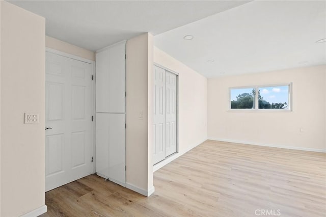 2134 Via Puerta Unit O, Laguna Woods, CA 92637 - empty room with light wood-type flooring and baseboards