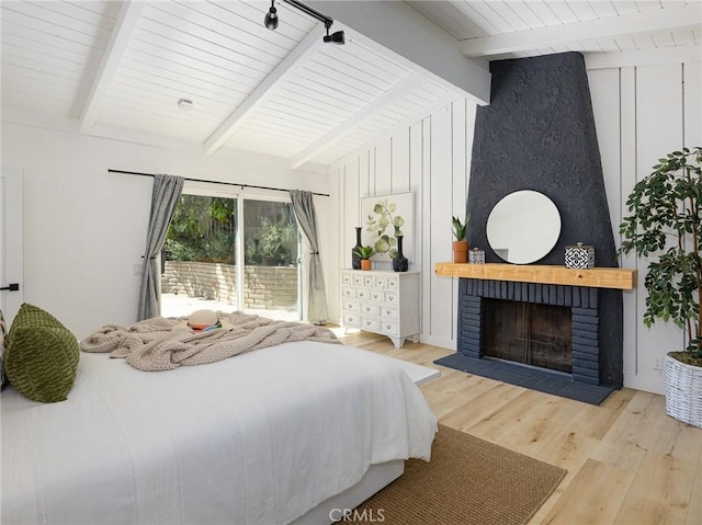 4068 Newton, Torrance, CA 90505 - bedroom with wood finished floors, a brick fireplace, and wood ceiling