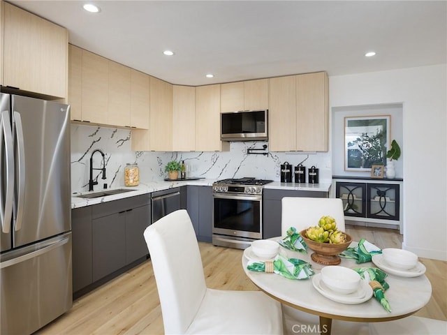 4068 Newton, Torrance, CA 90505 - kitchen featuring appliances with stainless steel finishes, a sink, light brown cabinetry, decorative backsplash, and recessed lighting