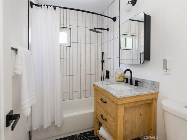 4068 Newton, Torrance, CA 90505 - full bath with vanity, shower / bath combo with shower curtain, toilet, and healthy amount of natural light