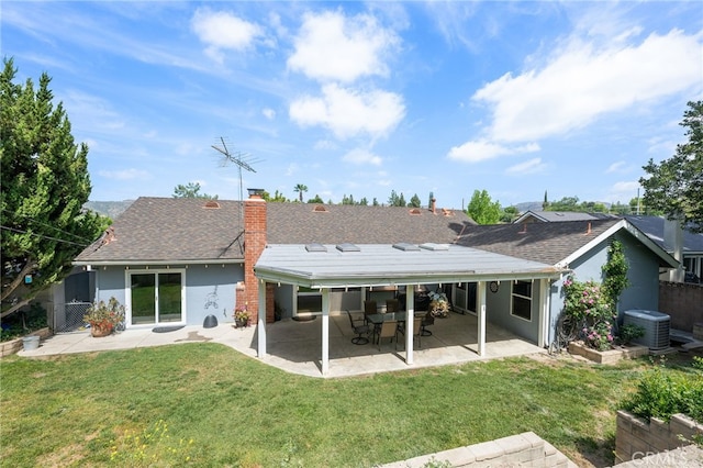 8204 Clemens Ave, West Hills, CA 91304 - rear view of house with stucco siding, a patio area, a shingled roof, and a chimney