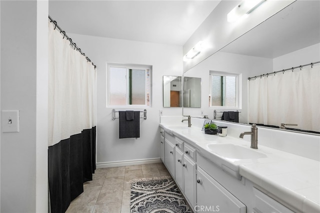 8204 Clemens Ave, West Hills, CA 91304 - full bathroom with double vanity and tile patterned floors