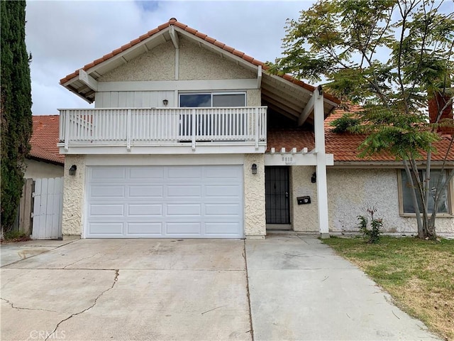 8818 Keremeos Way, San Diego, CA 92126 - view of front of property with driveway, a tile roof, an attached garage, and a balcony