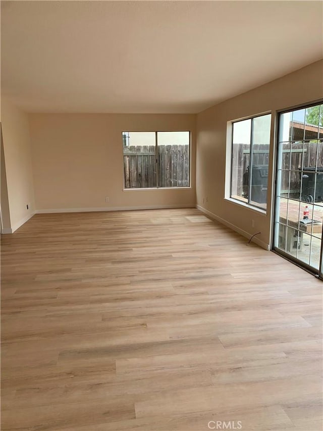 8818 Keremeos Way, San Diego, CA 92126 - spare room featuring light wood-type flooring
