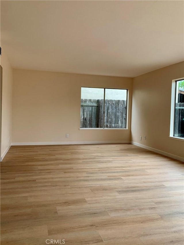 8818 Keremeos Way, San Diego, CA 92126 - unfurnished room with light wood-type flooring