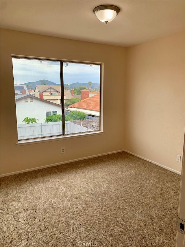 8818 Keremeos Way, San Diego, CA 92126 - empty room with carpet flooring and baseboards