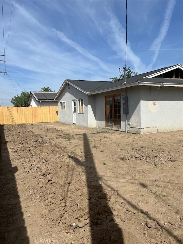1565 Bluejay Cir, Hanford, CA 93230 - back of house with stucco siding and fence