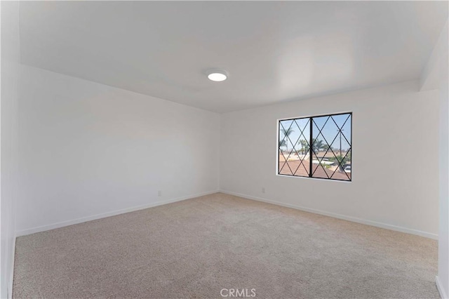 942 E Denwall Dr, Carson, CA 90746 - carpeted empty room featuring baseboards