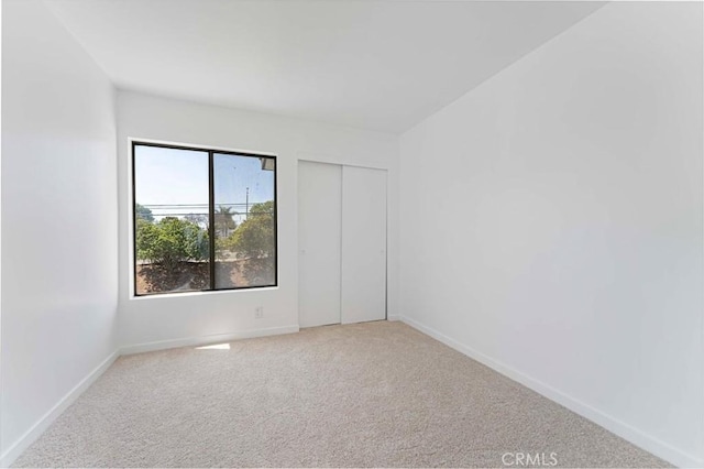 942 E Denwall Dr, Carson, CA 90746 - unfurnished room with light colored carpet and baseboards