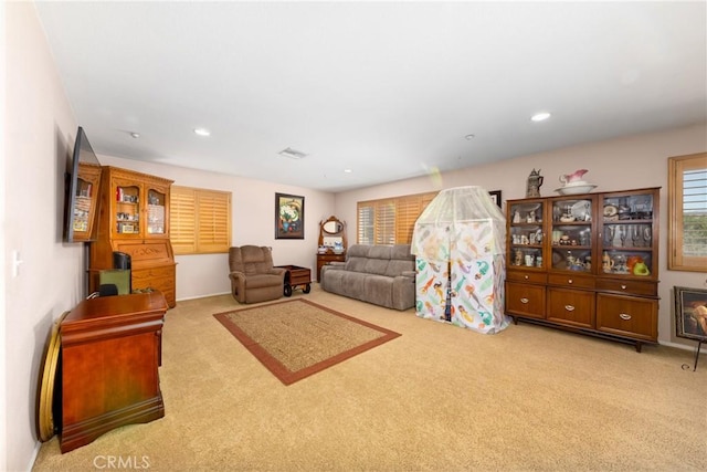 6122 Glen Abbey Pl, Fontana, CA 92336 - living area featuring carpet floors and recessed lighting