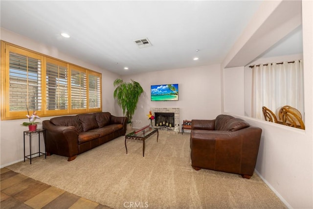 6122 Glen Abbey Pl, Fontana, CA 92336 - living room featuring recessed lighting, baseboards, and a fireplace