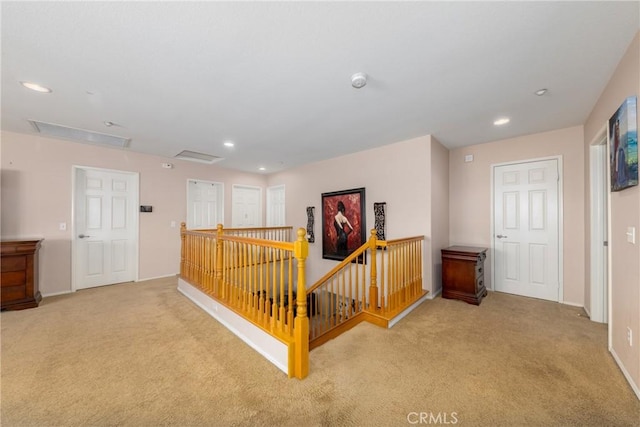 6122 Glen Abbey Pl, Fontana, CA 92336 - hall featuring an upstairs landing, carpet flooring, attic access, recessed lighting, and baseboards