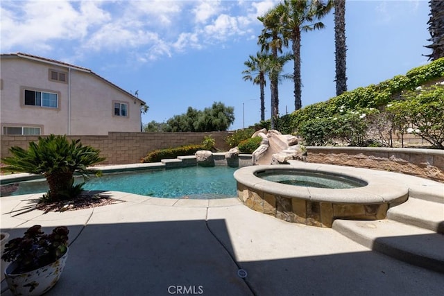 6122 Glen Abbey Pl, Fontana, CA 92336 - view of pool featuring an in-ground hot tub and a fenced backyard