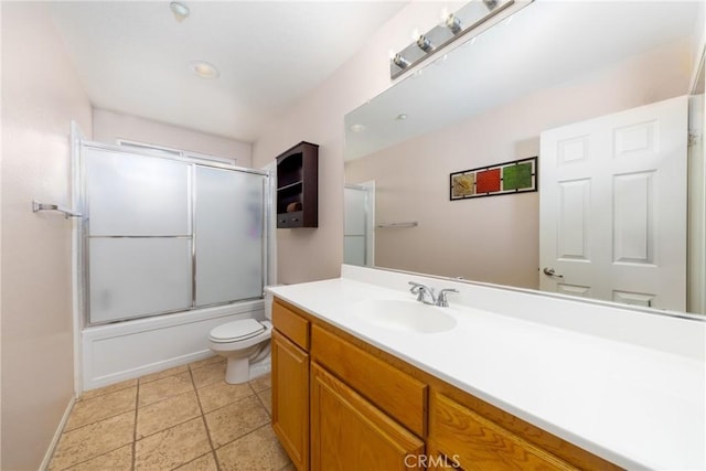 6122 Glen Abbey Pl, Fontana, CA 92336 - bathroom with toilet, vanity, shower / bath combination with glass door, and baseboards