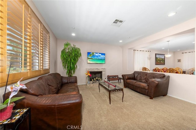 6122 Glen Abbey Pl, Fontana, CA 92336 - living area featuring recessed lighting, baseboards, carpet flooring, and a fireplace