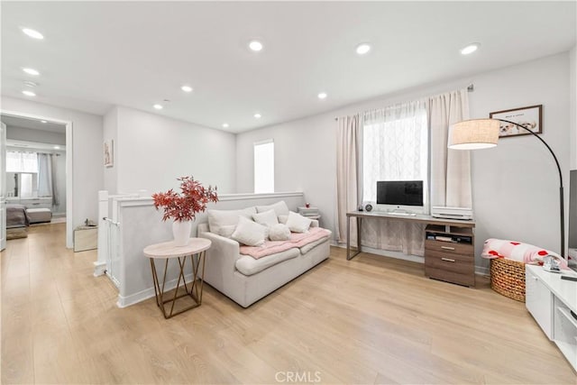 27218 Narrowleaf Willow Ln, Valencia, CA 91381 - living area featuring light wood-type flooring, plenty of natural light, and recessed lighting