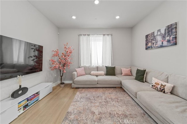 27218 Narrowleaf Willow Ln, Valencia, CA 91381 - living room featuring wood finished floors, recessed lighting, and baseboards