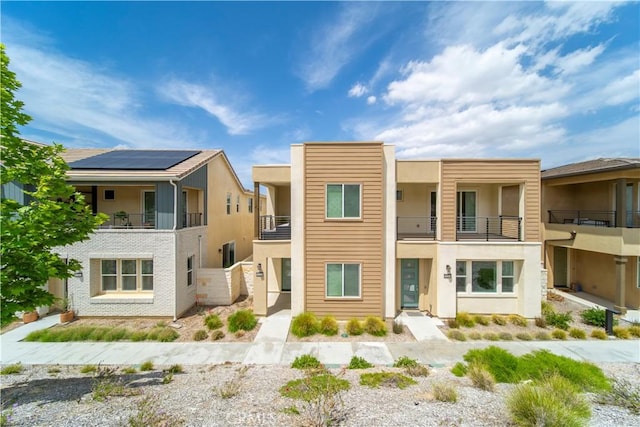 27218 Narrowleaf Willow Ln, Valencia, CA 91381 - multi unit property featuring a balcony and stucco siding