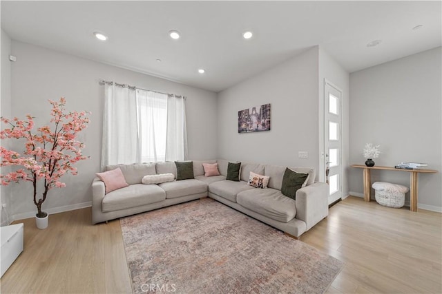 27218 Narrowleaf Willow Ln, Valencia, CA 91381 - living room with light wood-type flooring, recessed lighting, and baseboards