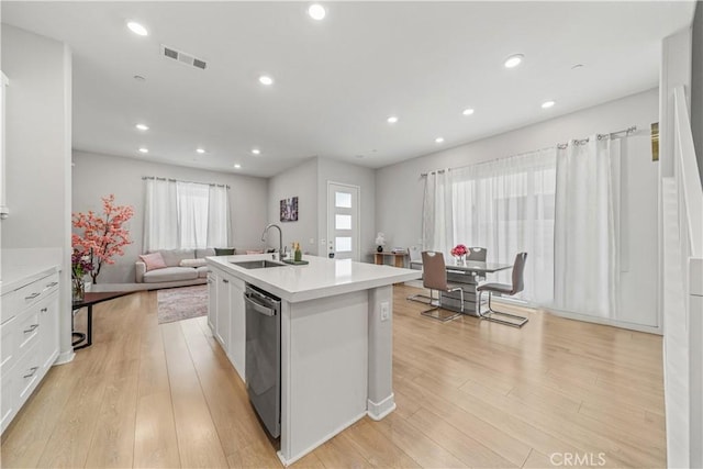 27218 Narrowleaf Willow Ln, Valencia, CA 91381 - kitchen with healthy amount of natural light, a sink, dishwasher, light countertops, and recessed lighting