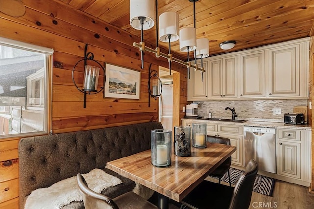 921 Anita Ave, Big Bear City, CA 92314 - kitchen featuring dishwasher, a sink, cream cabinets, wooden ceiling, and light countertops