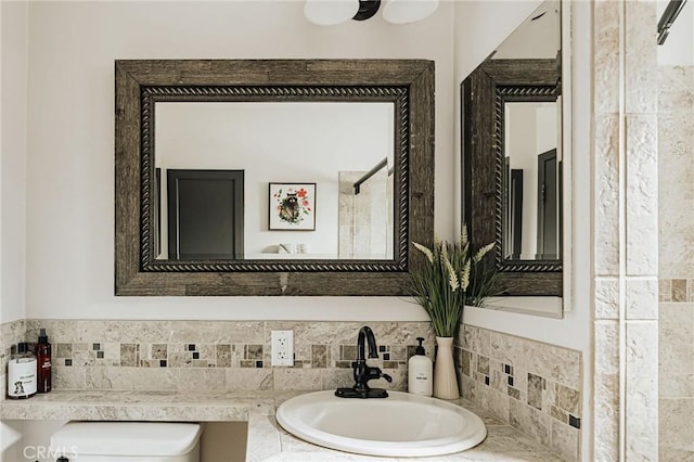 921 Anita Ave, Big Bear City, CA 92314 - bathroom featuring decorative backsplash, toilet, and vanity
